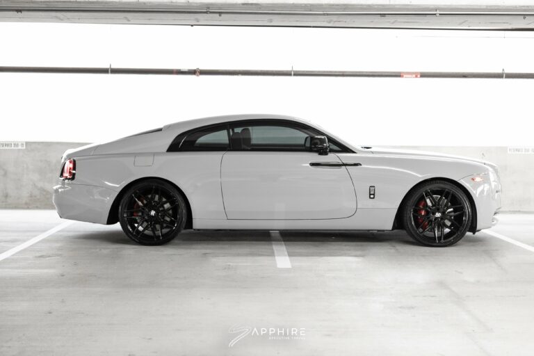 Side View of a White Rolls Royce Wraith