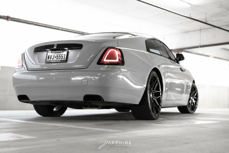 Rear Right View of a White Rolls Royce Wraith