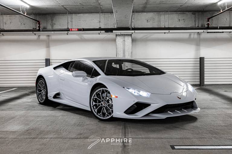 Front Right View of a White Lamborghini Huracan