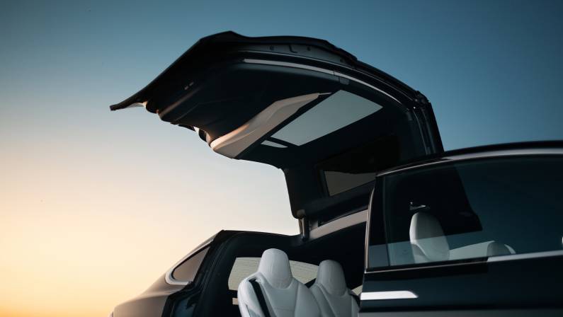 Expensive and luxury crossover with falcon wings style door